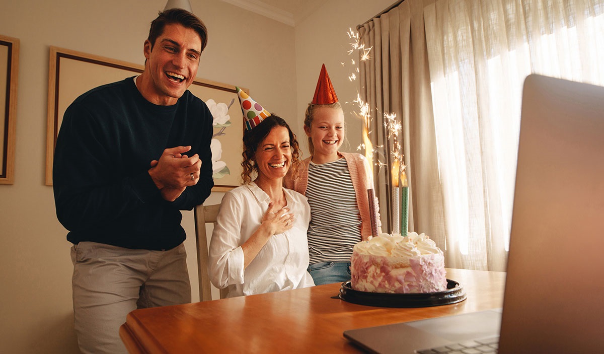 Young professional CPA couple on tablet outside